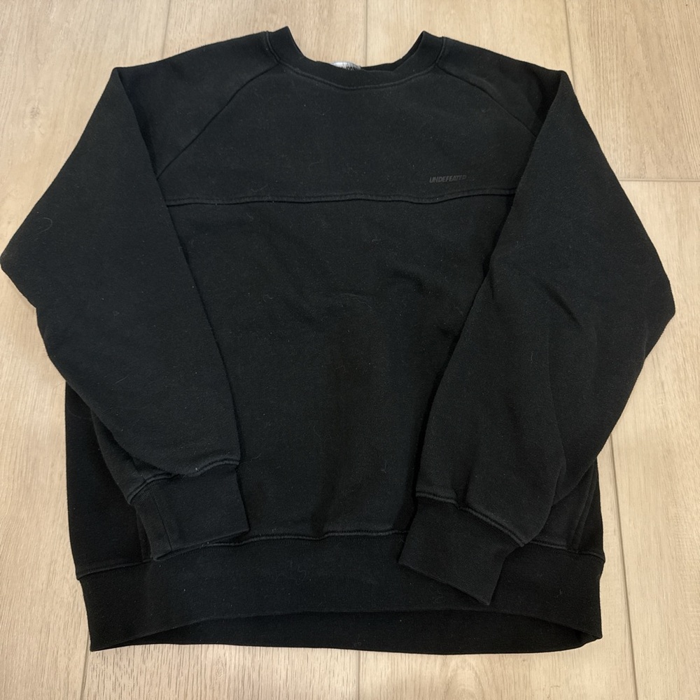 Undefeated Black Crewneck Sweater with Ribbed Cuffs Unisex size S